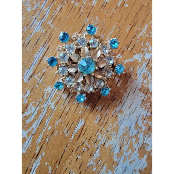 Vintage Blue Rhinestone Sunburst Brooch pin With Gold Tone Leaves - Picture 1 of 4